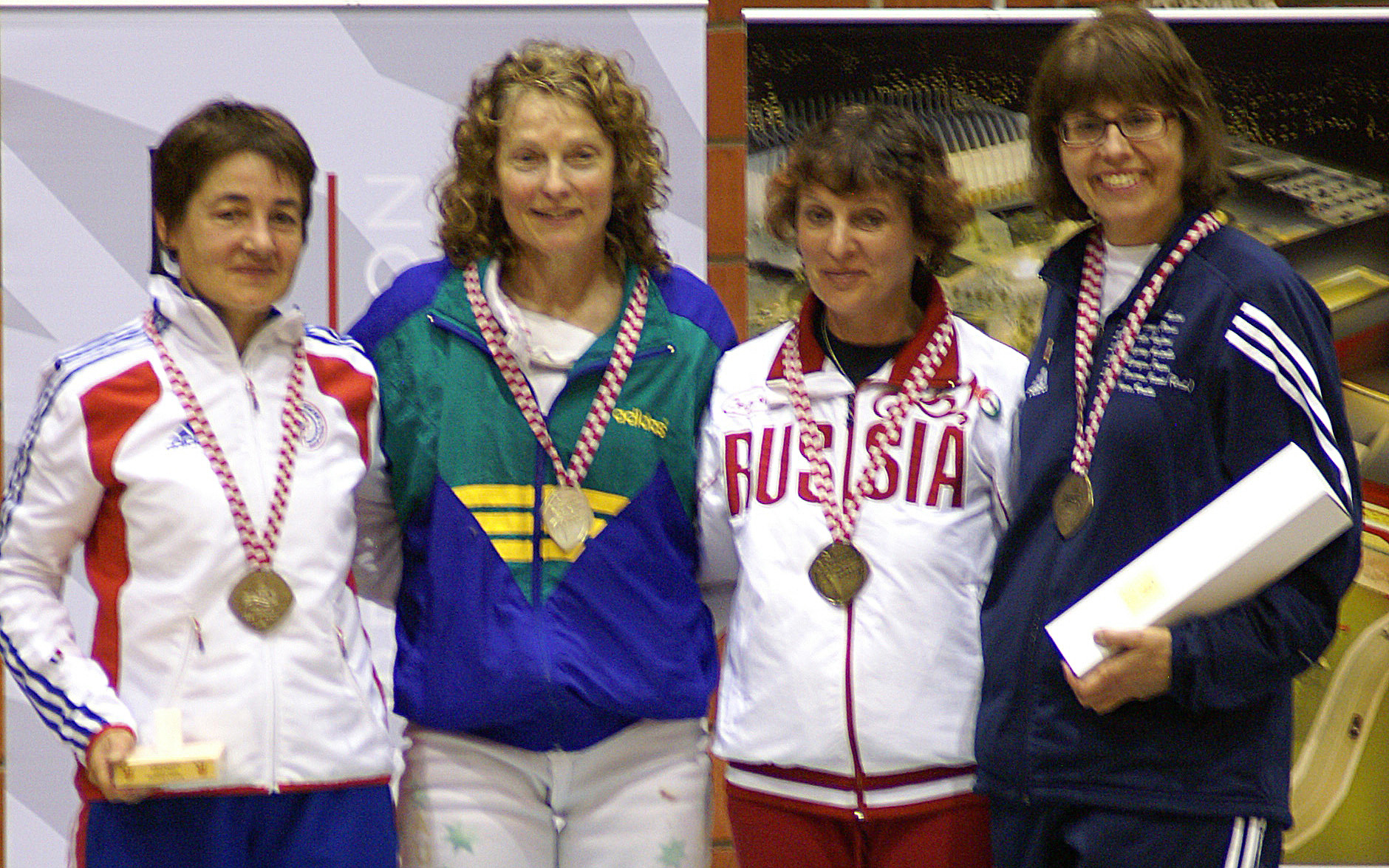 Marianne Bosco, Assistant Coach and wife of Charles Bosco, celebrating her medal achievement at an international epee competition in Croatia, Central Europe