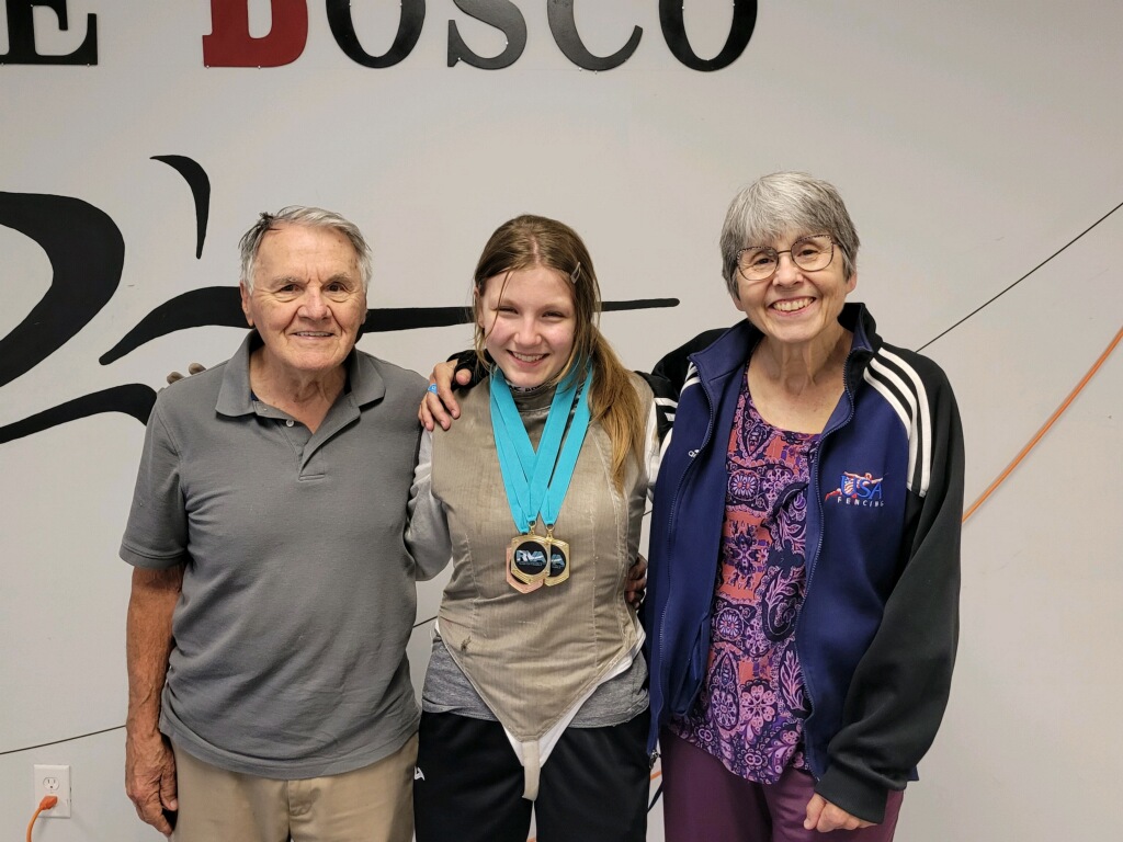 Gianna Marisi proudly displaying her 2 gold medals and 1 bronze medal from the RVA foil tournament competition