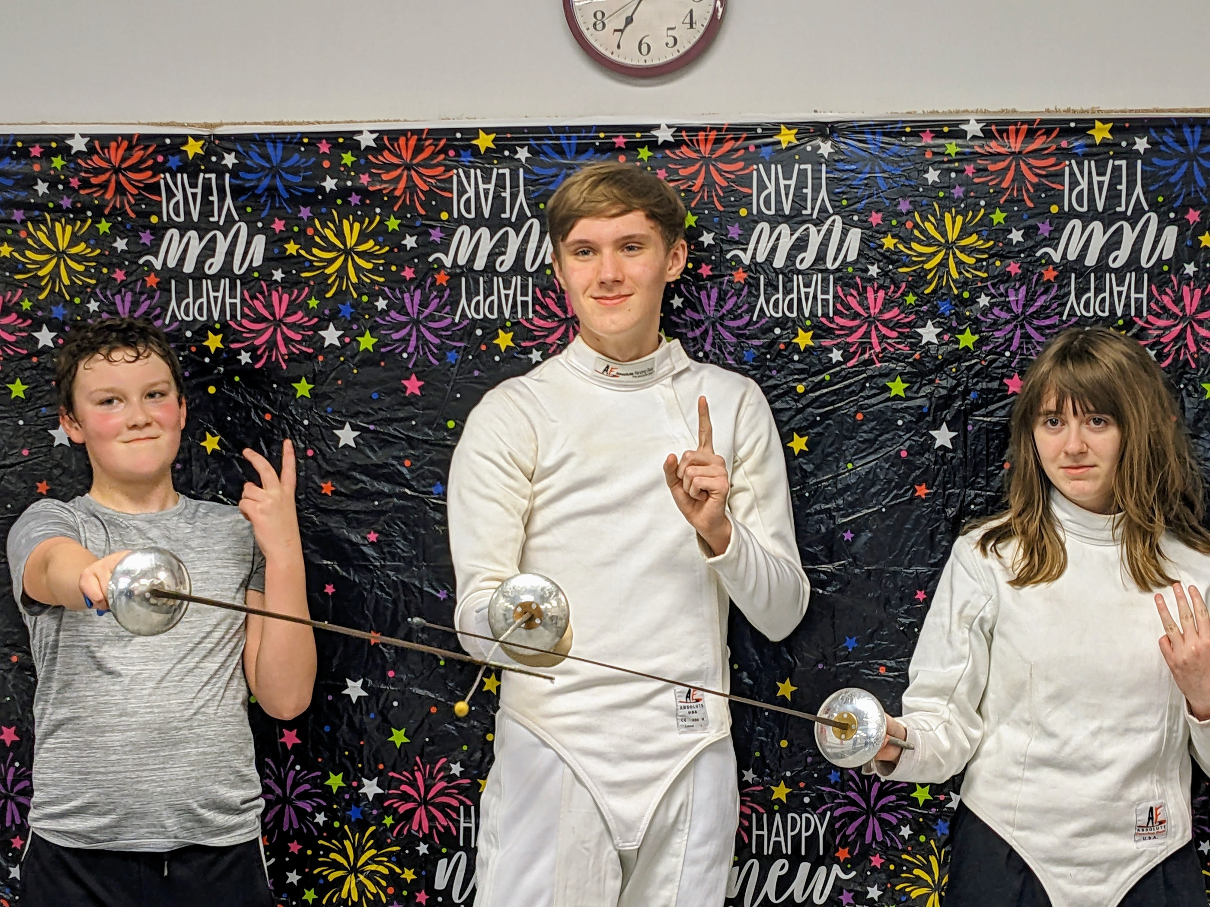 Fun unrated foil meet celebrating the New Year with family and fencers at Salle D'Armes Bosco in Madison, Alabama, showcasing community spirit